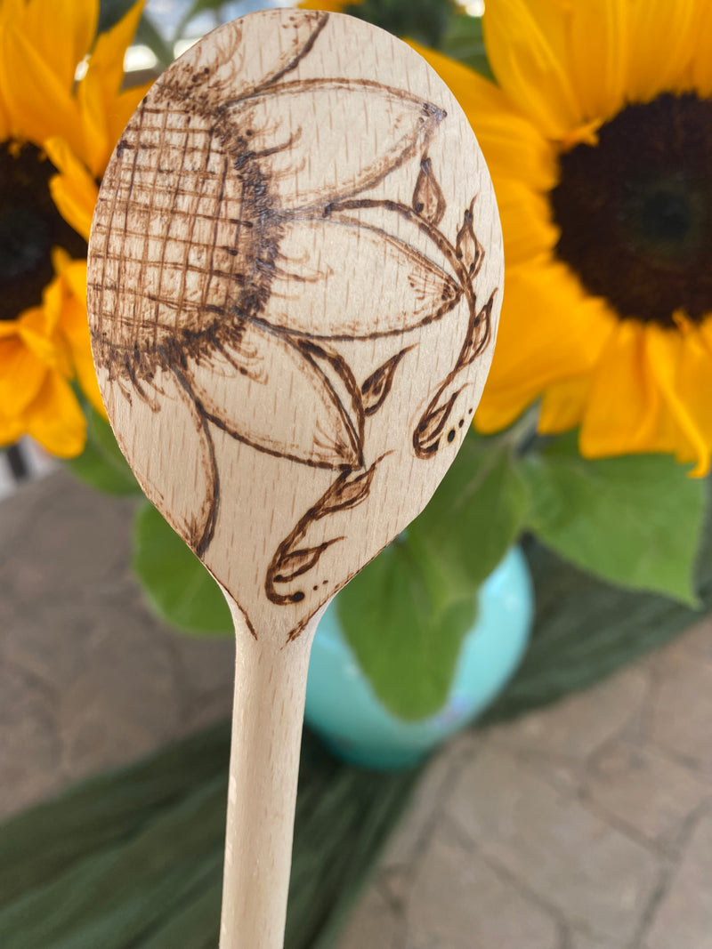 Beautiful, long handled wooden spoons, hand designed and hand engraved with sunflower
